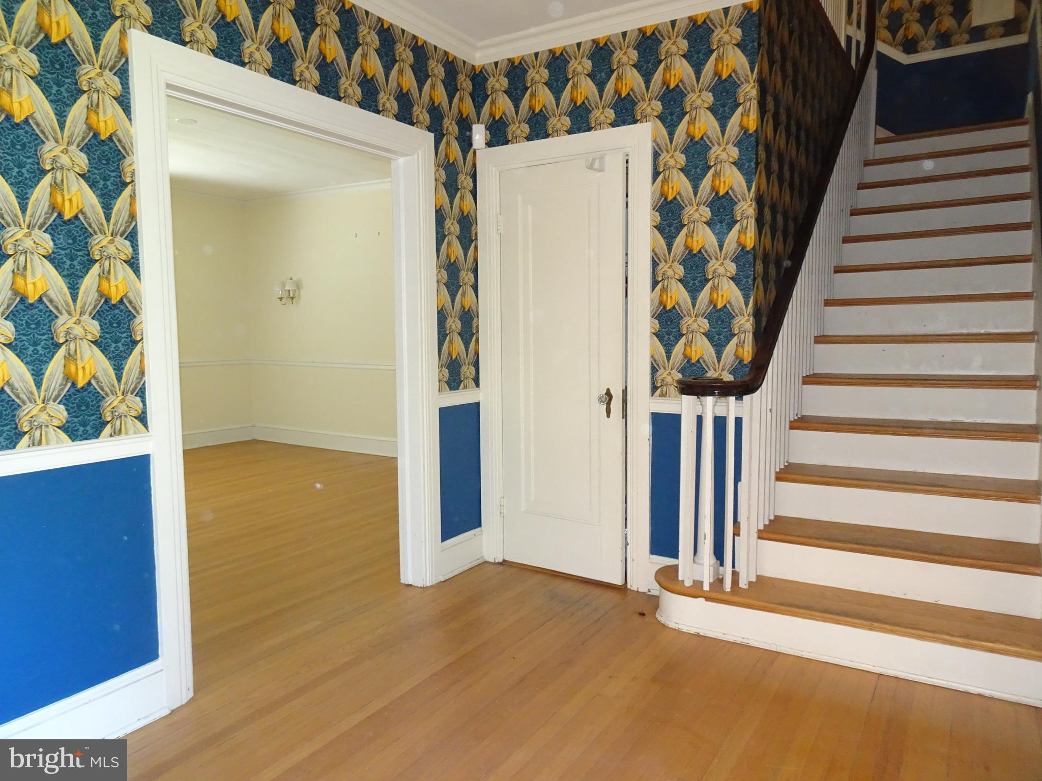 343 Tunbridge Road Baltimore, MD 21212 - Photo 5 of 39 LARGE ENTRANCE FOYER WITH WOOD FLOORS OPEN STAIRS