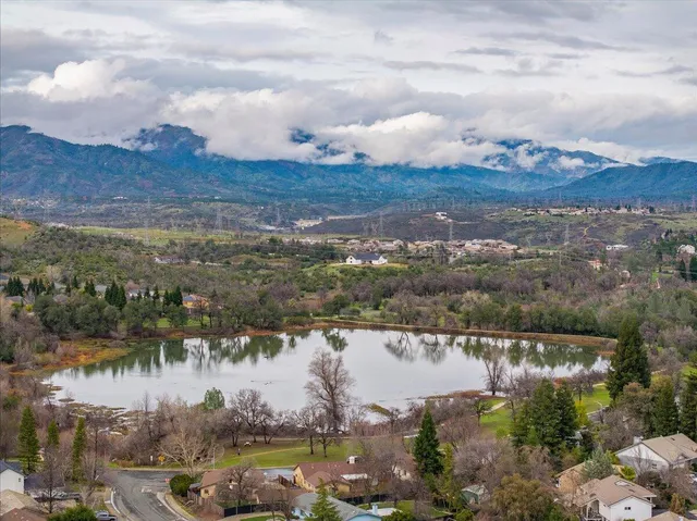 a view of lake with mountain