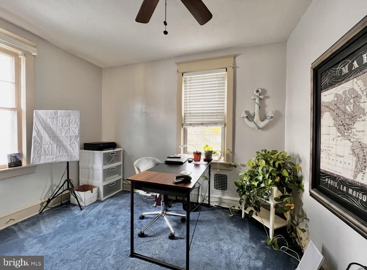 7041 Harvey Avenue Pennsauken, NJ 08109 - Photo 9 of 10 a workspace with furniture and window