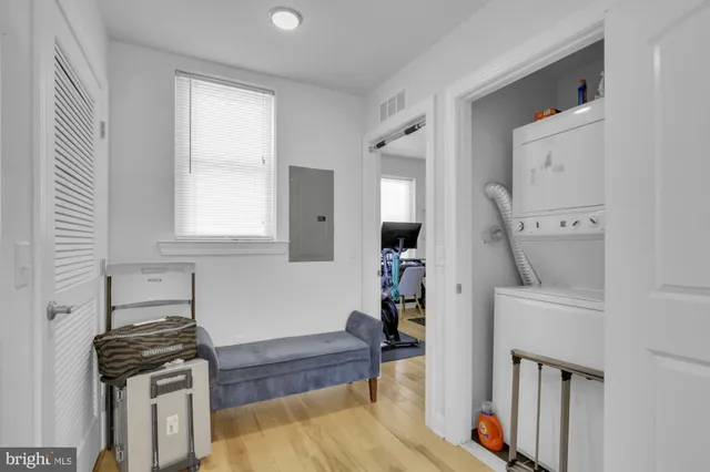 a kitchen with stainless steel appliances a stove a sink and a refrigerator