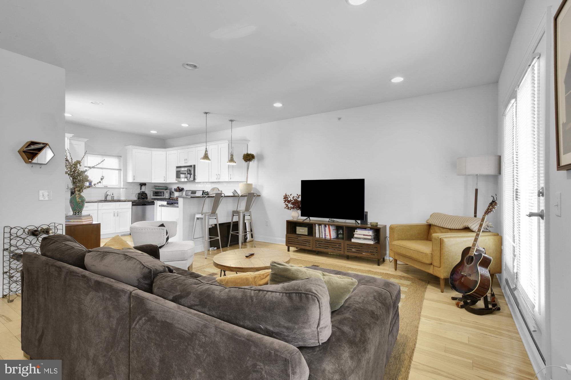 2302 Collins Street Philadelphia, PA 19125 - Photo 24 of 37 a living room with furniture and a flat screen tv
