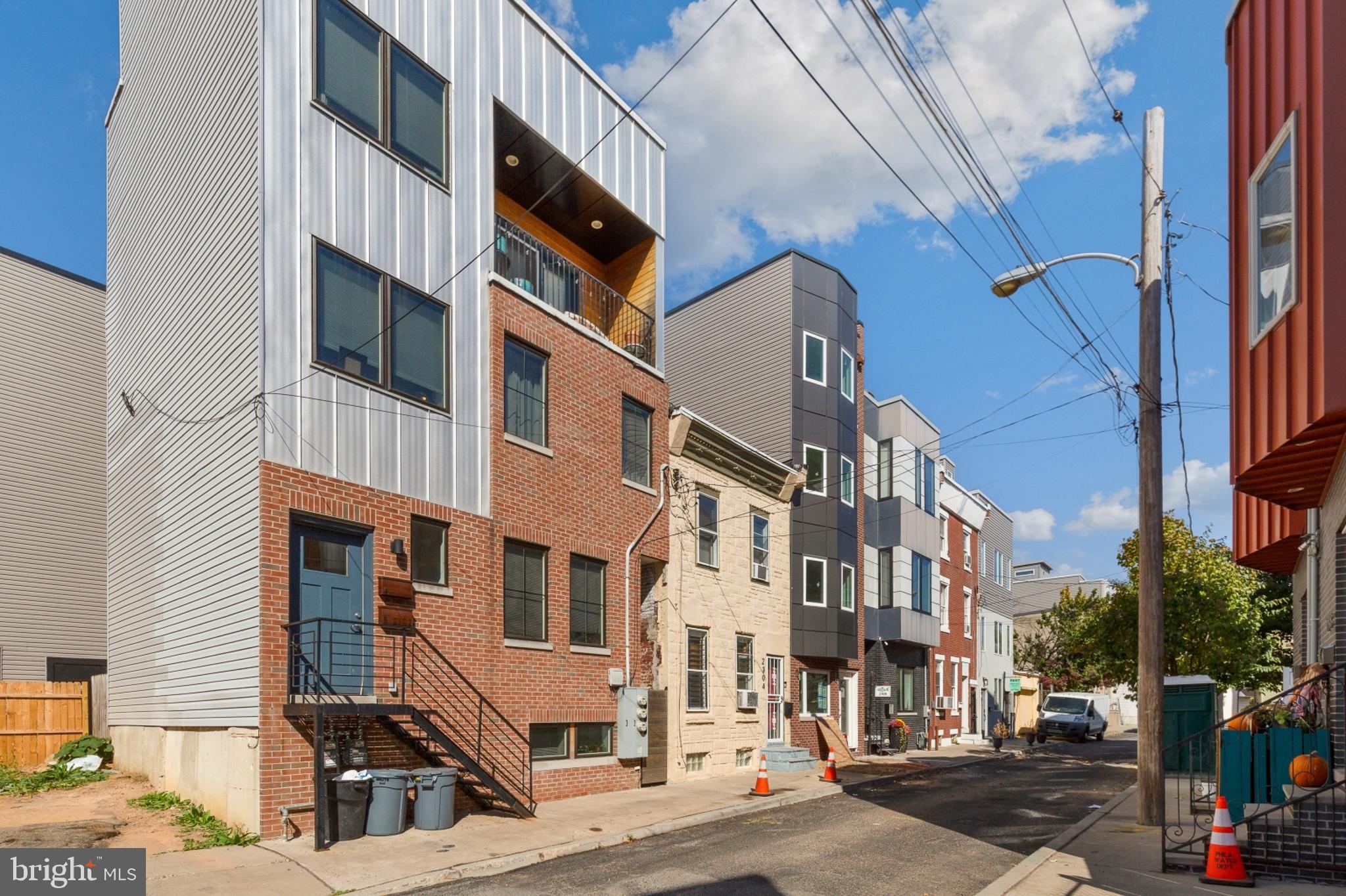 2302 Collins Street Philadelphia, PA 19125 - Photo 37 of 37 a front view of a building with street view