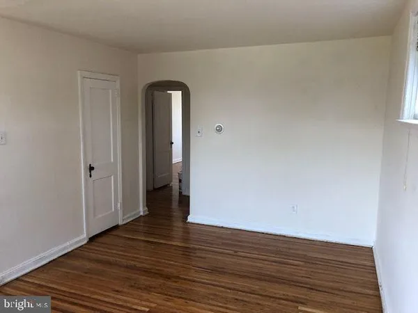 a view of a livingroom with wooden floor