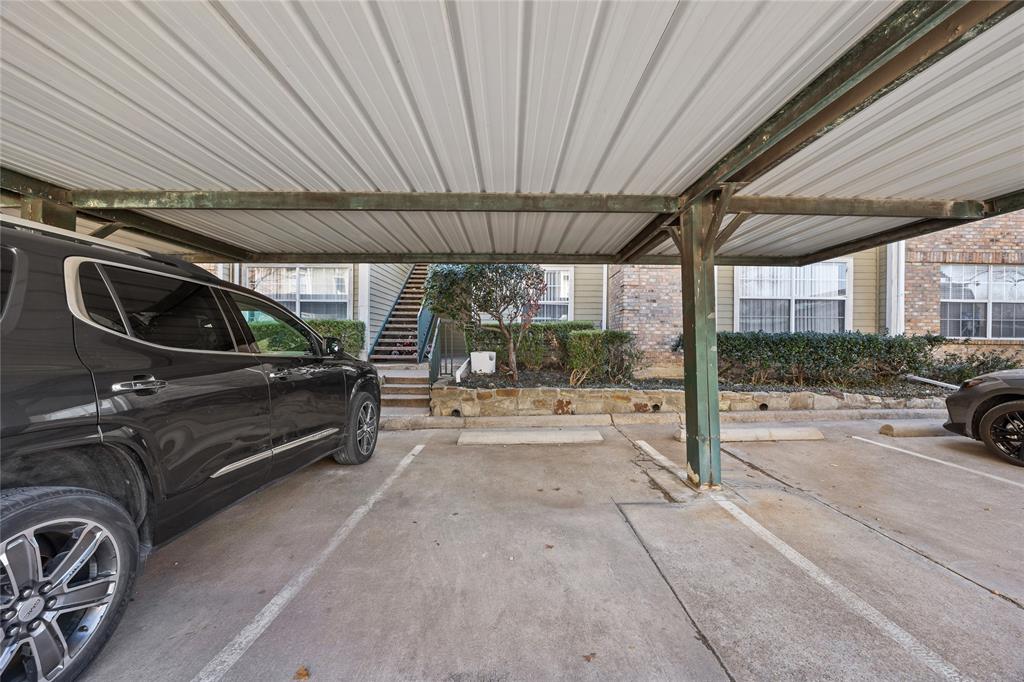 4115 Esters Road, Unit 710 Irving, TX 75038 - Photo 13 of 14 a view of a car parking garage