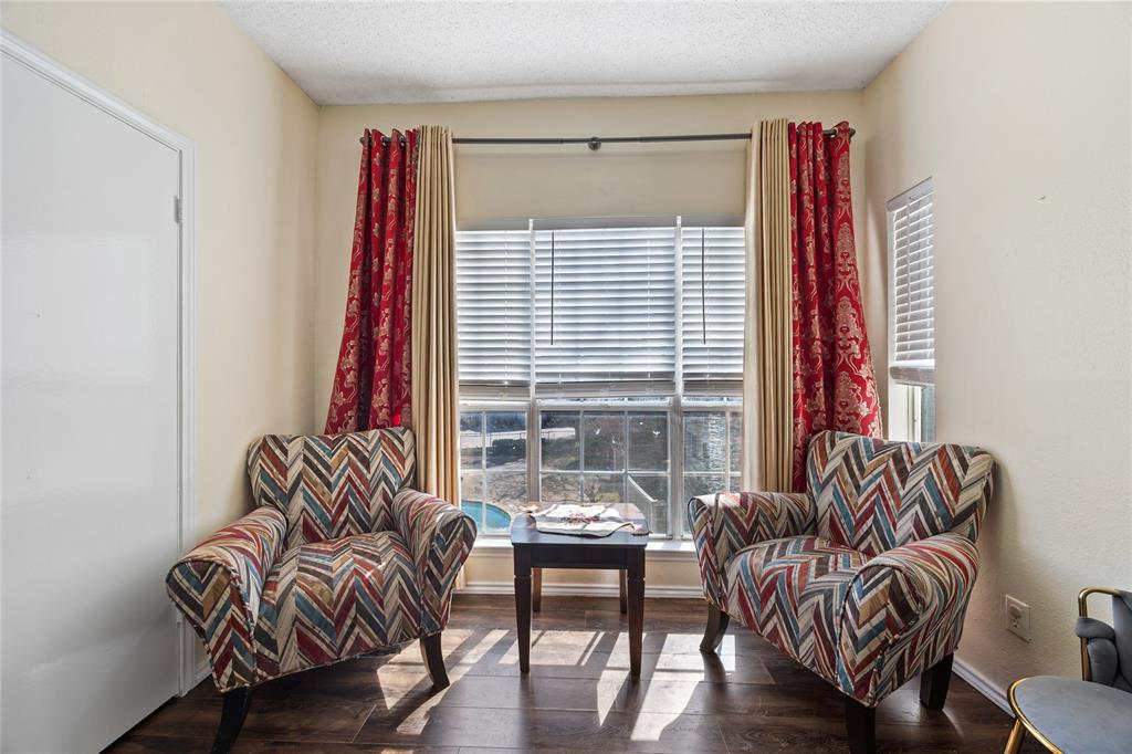 4115 Esters Road, Unit 710 Irving, TX 75038 - Photo 3 of 14 a living room with furniture and a large window
