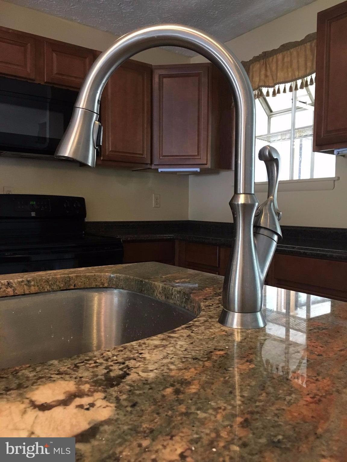 7902 New Freetown Road Pasadena, MD 21122 - Photo 3 of 30 Granite Center Island