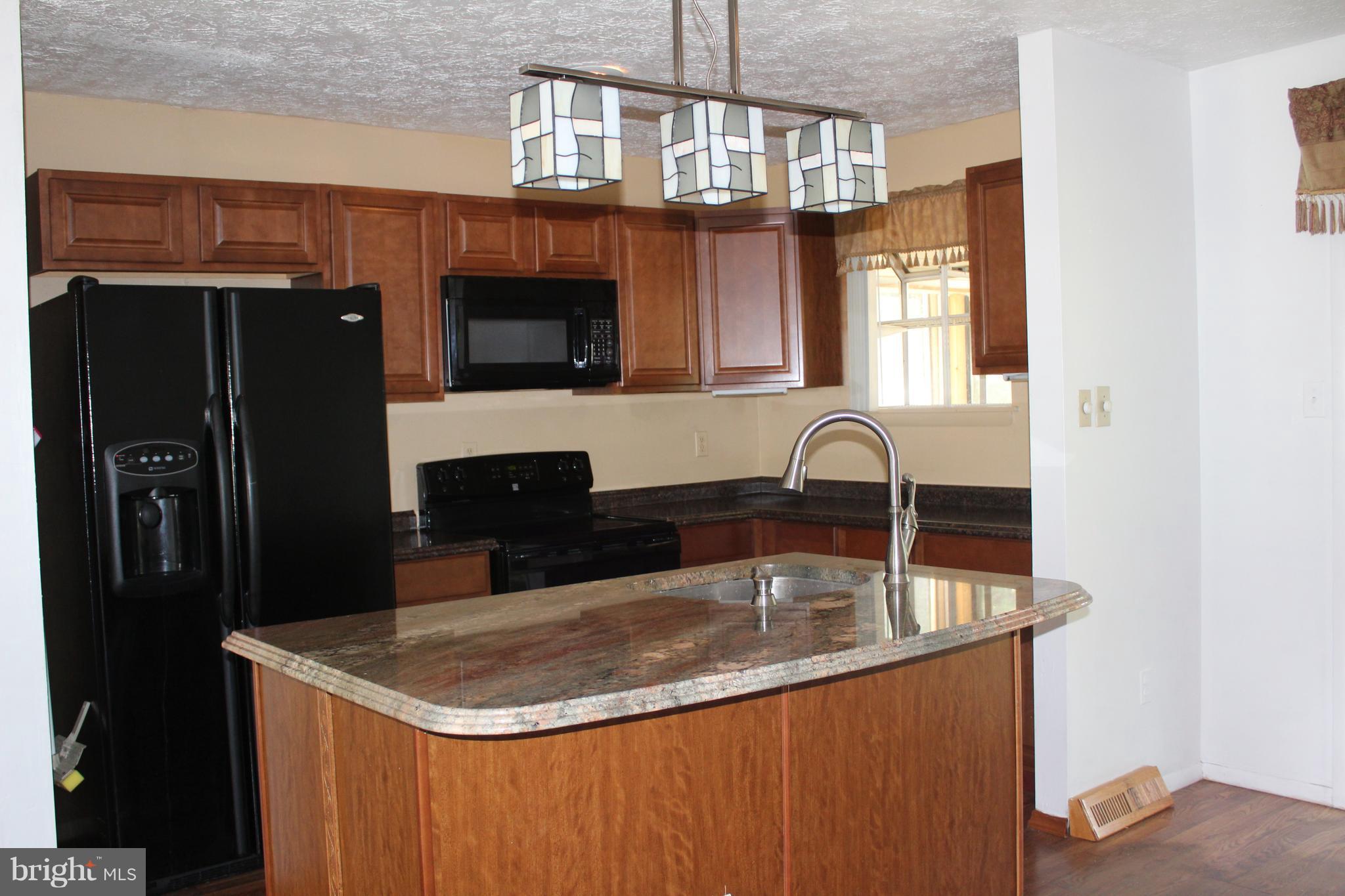 7902 New Freetown Road Pasadena, MD 21122 - Photo 5 of 30 Kitchen