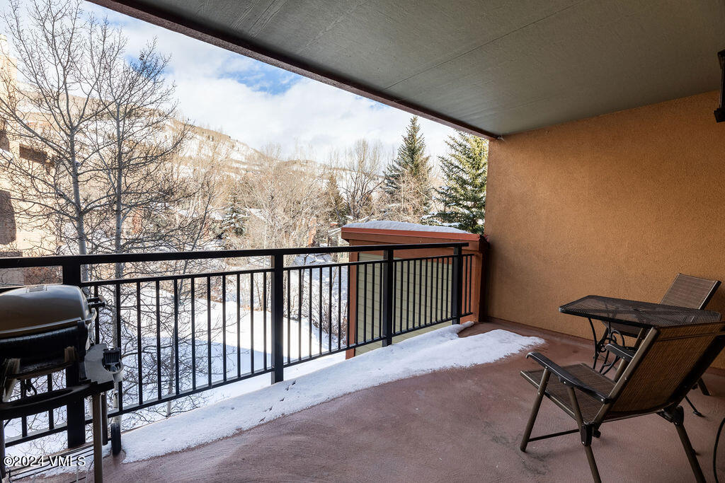 993 Lions Ridge Loop, Unit 343 Vail, CO 81657 - Photo 13 of 15 a view of a two chairs in the balcony