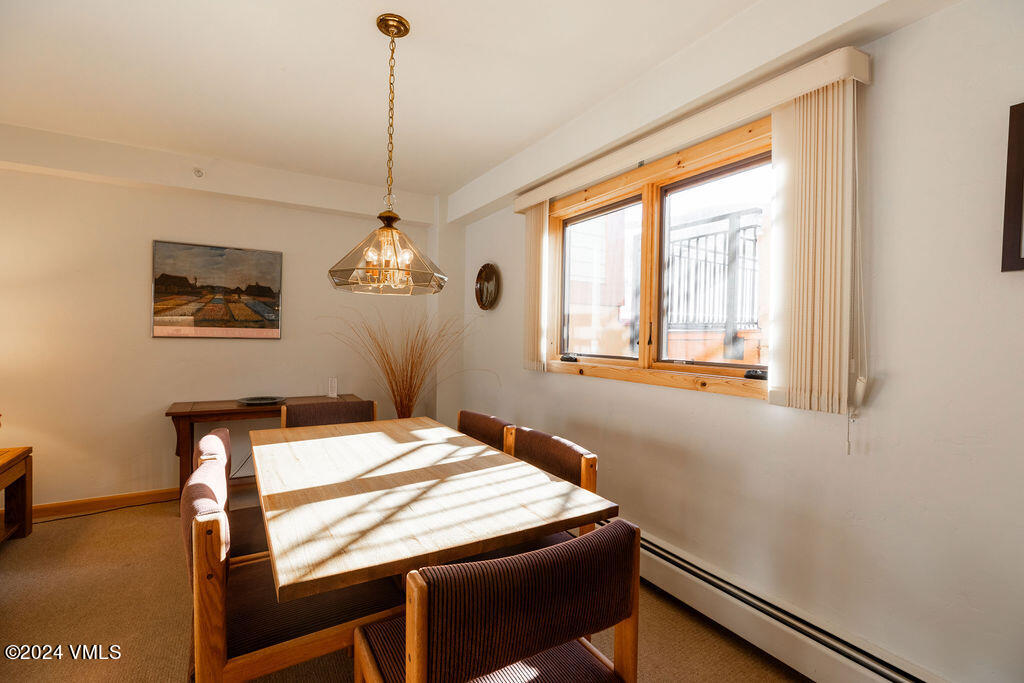 993 Lions Ridge Loop, Unit 343 Vail, CO 81657 - Photo 5 of 15 a dining room with window