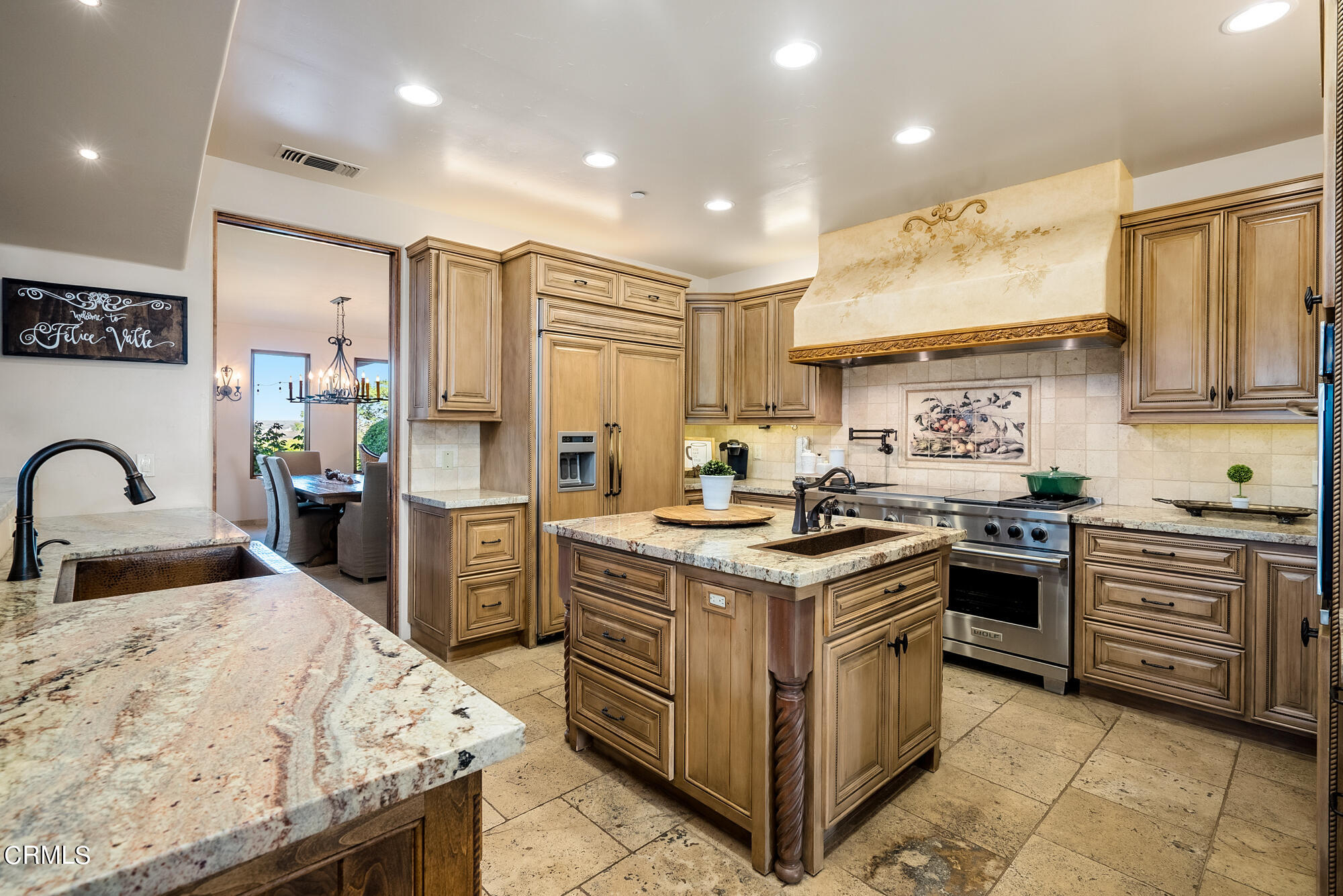 6060 Jardine Road Paso Robles, CA 93446 - Photo 14 of 74 a kitchen with stainless steel appliances granite countertop a stove top oven a sink a refrigerator and white cabinets with wooden floor