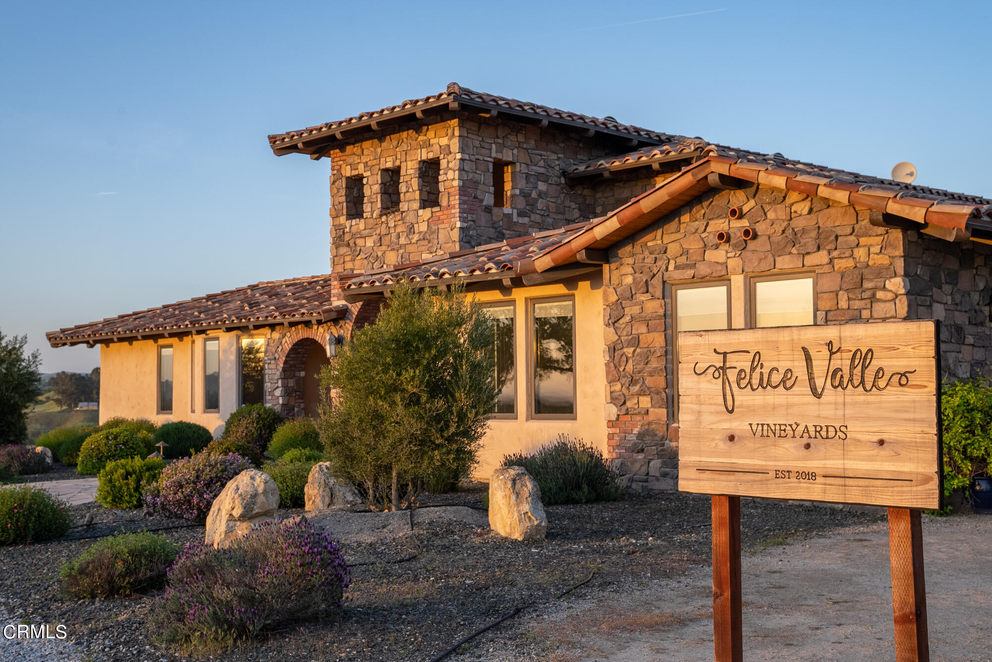 6060 Jardine Road Paso Robles, CA 93446 - Photo 2 of 74 a front view of a house with sign board