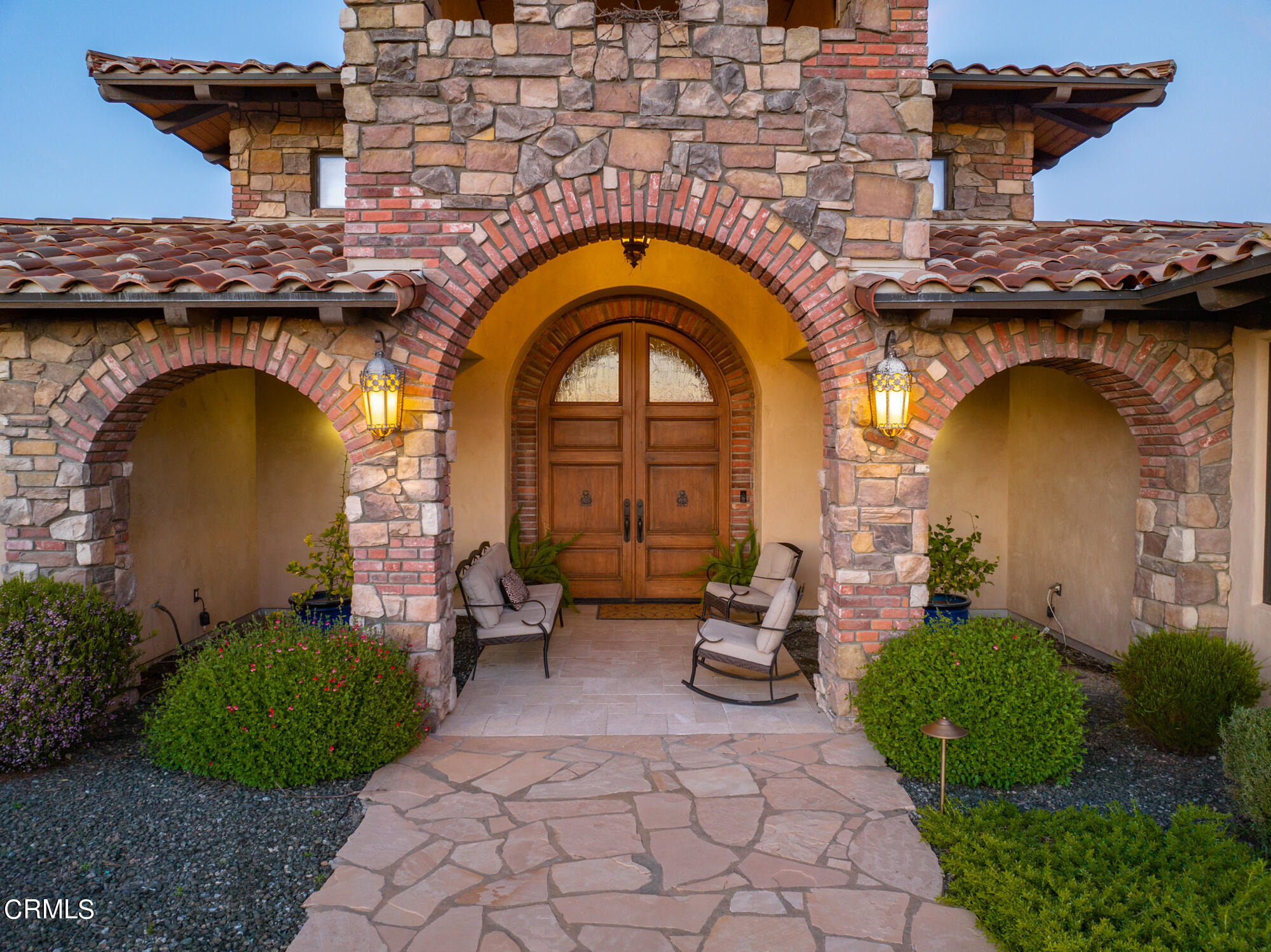 6060 Jardine Road Paso Robles, CA 93446 - Photo 3 of 74 a front view of a house with garden