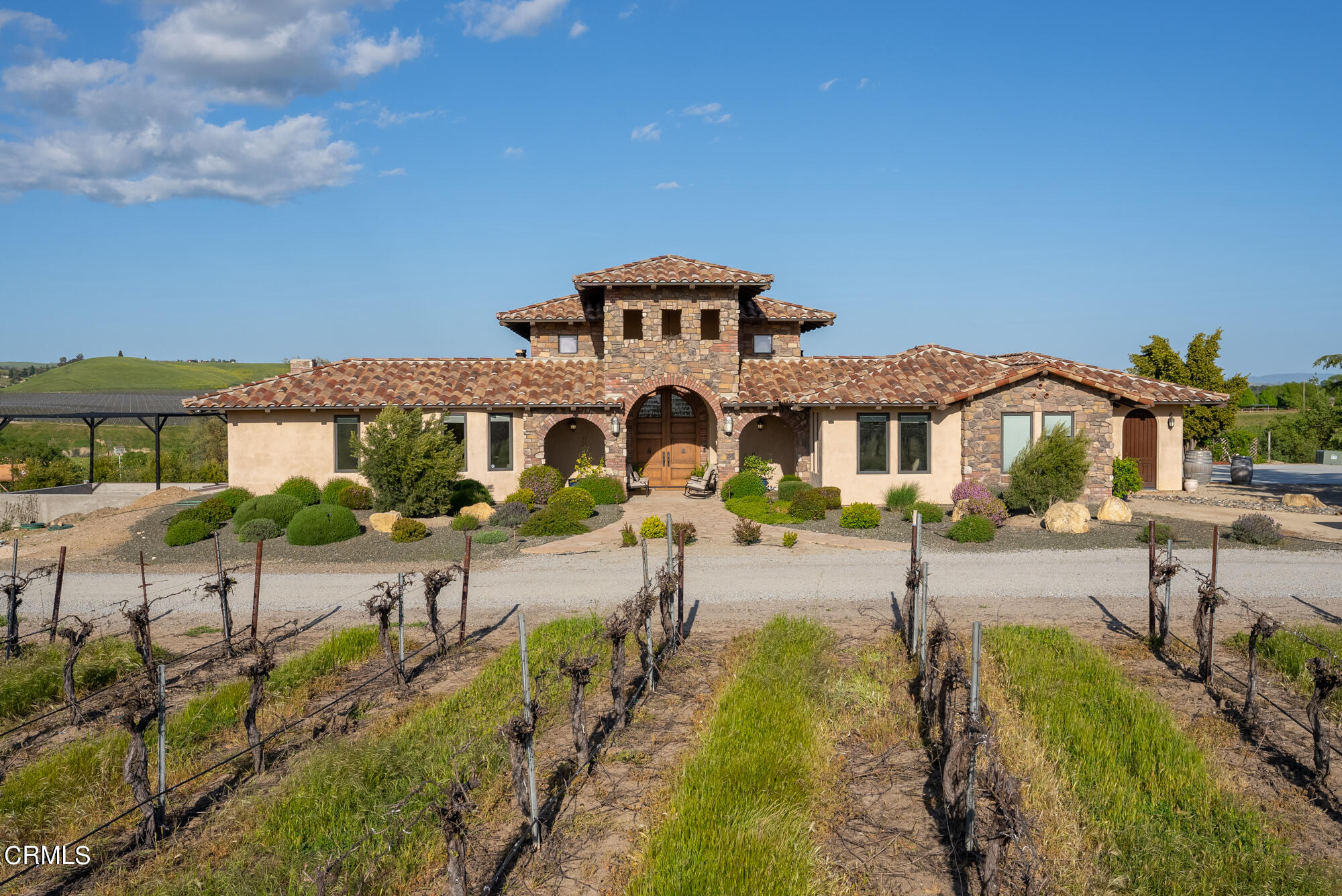6060 Jardine Road Paso Robles, CA 93446 - Photo 56 of 74 a front view of a house with a yard