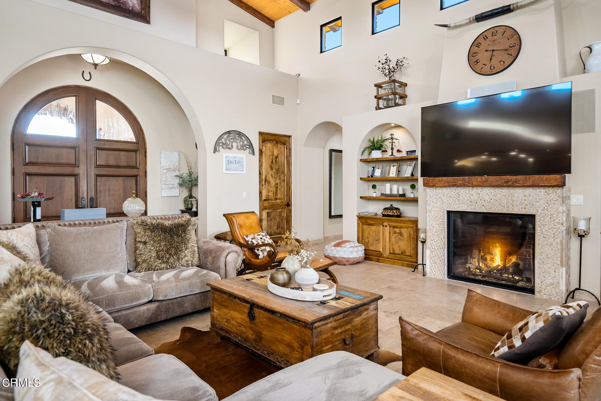 6060 Jardine Road Paso Robles, CA 93446 - Photo 7 of 74 a living room with furniture a flat screen tv and a fireplace