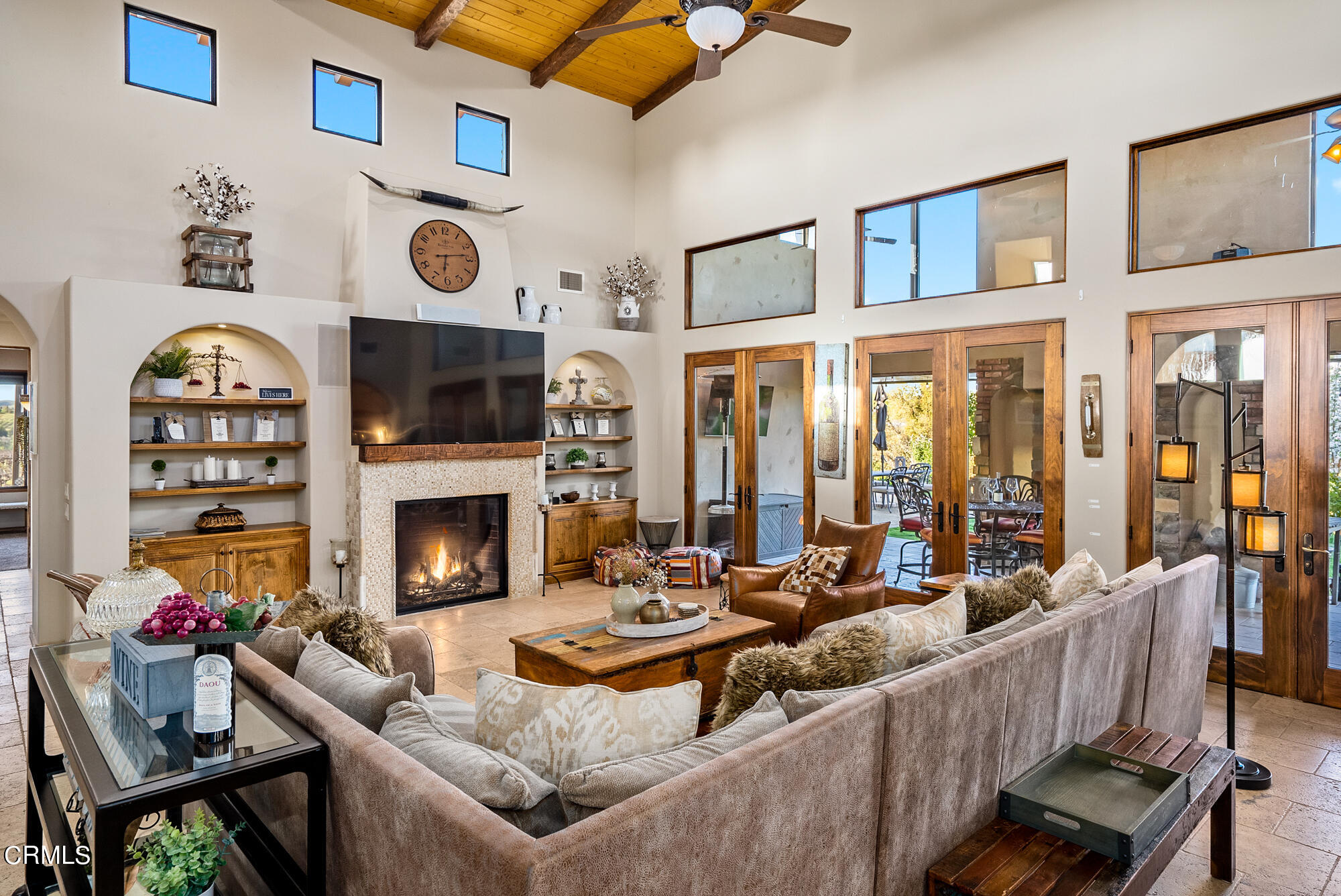 6060 Jardine Road Paso Robles, CA 93446 - Photo 10 of 74 a living room with furniture a flat screen tv and a fireplace