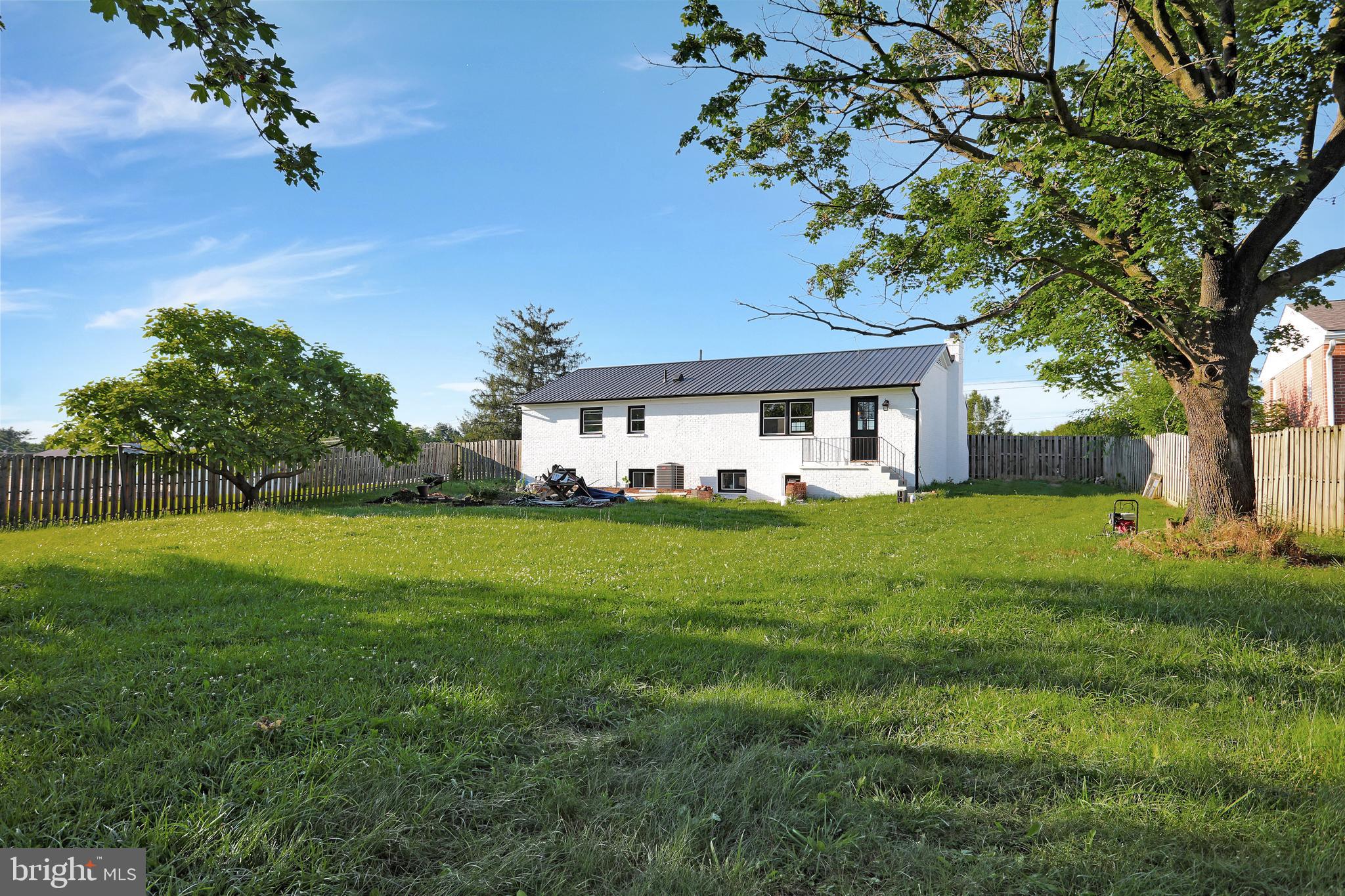 3192 Old Leetown Pike Ranson, WV 25438 - Photo 47 of 50 a front view of a house with garden