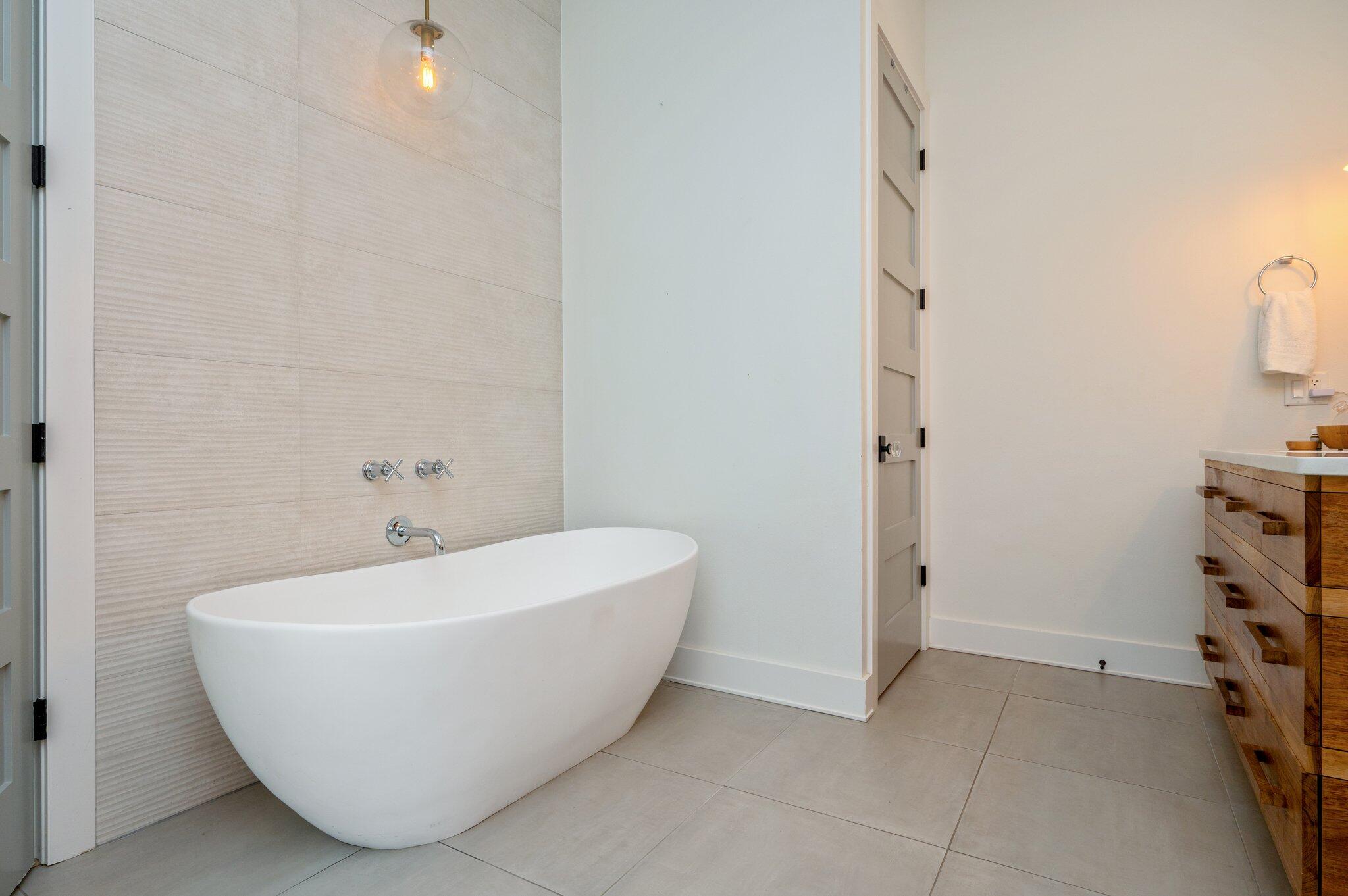 164 Bay Trace Santa Rosa Beach, FL 32459 - Photo 36 of 90 a white bath tub sitting in a bathroom