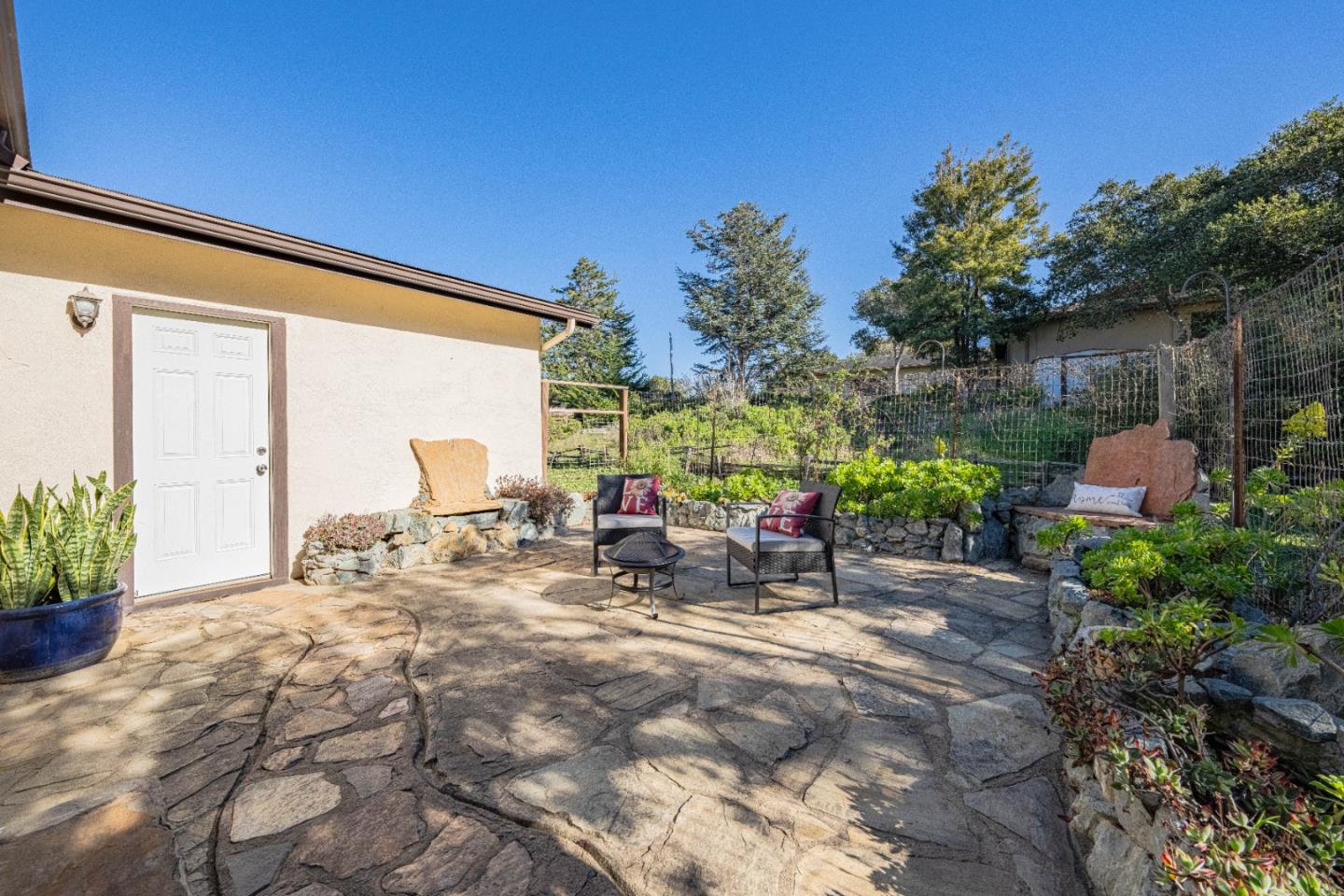 9525 South Century Oak Road Salinas, CA 93907 - Photo 13 of 37 a view of a backyard with plants and a patio