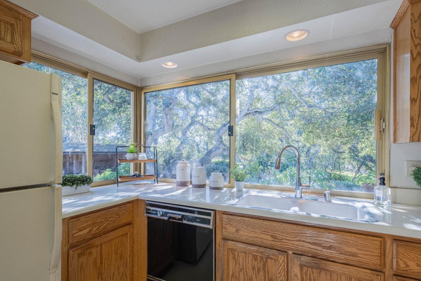 9525 South Century Oak Road Salinas, CA 93907 - Photo 18 of 37 a kitchen with granite countertop a sink and a window