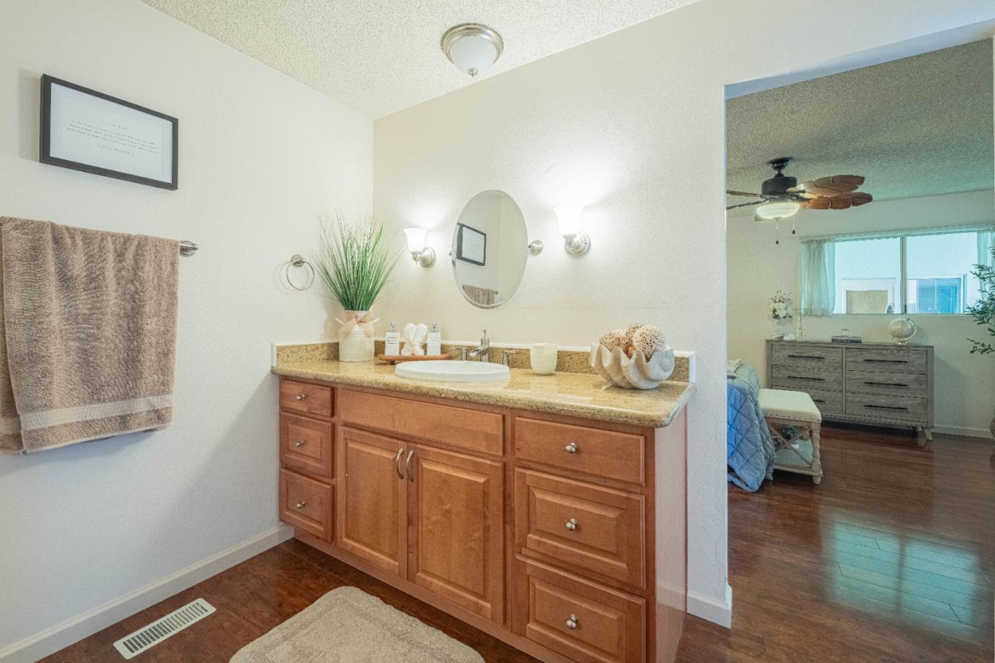 9525 South Century Oak Road Salinas, CA 93907 - Photo 26 of 37 a spacious bathroom with a granite countertop sink a mirror and a shower