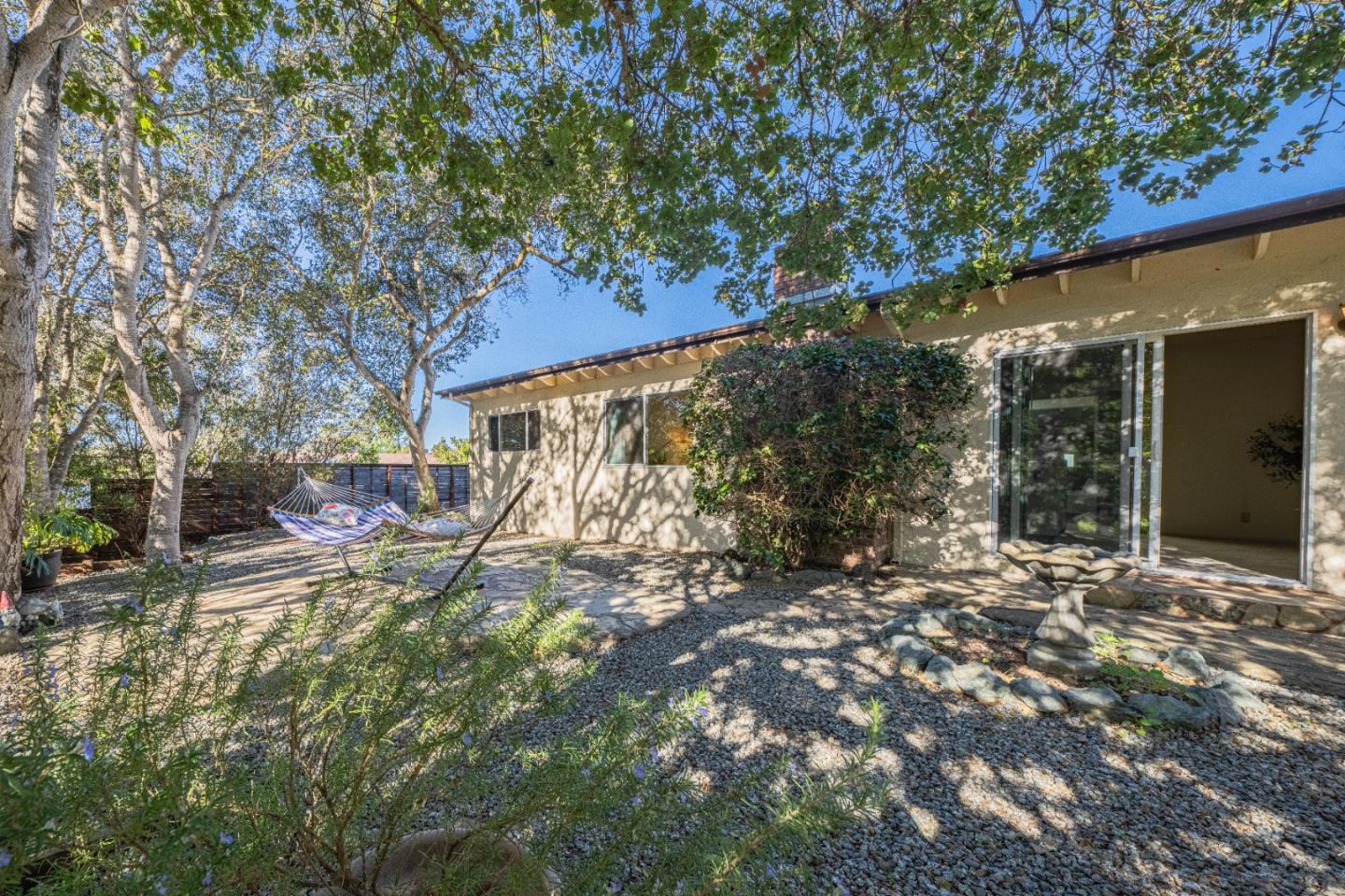 9525 South Century Oak Road Salinas, CA 93907 - Photo 5 of 37 a backyard of a house with table and chairs