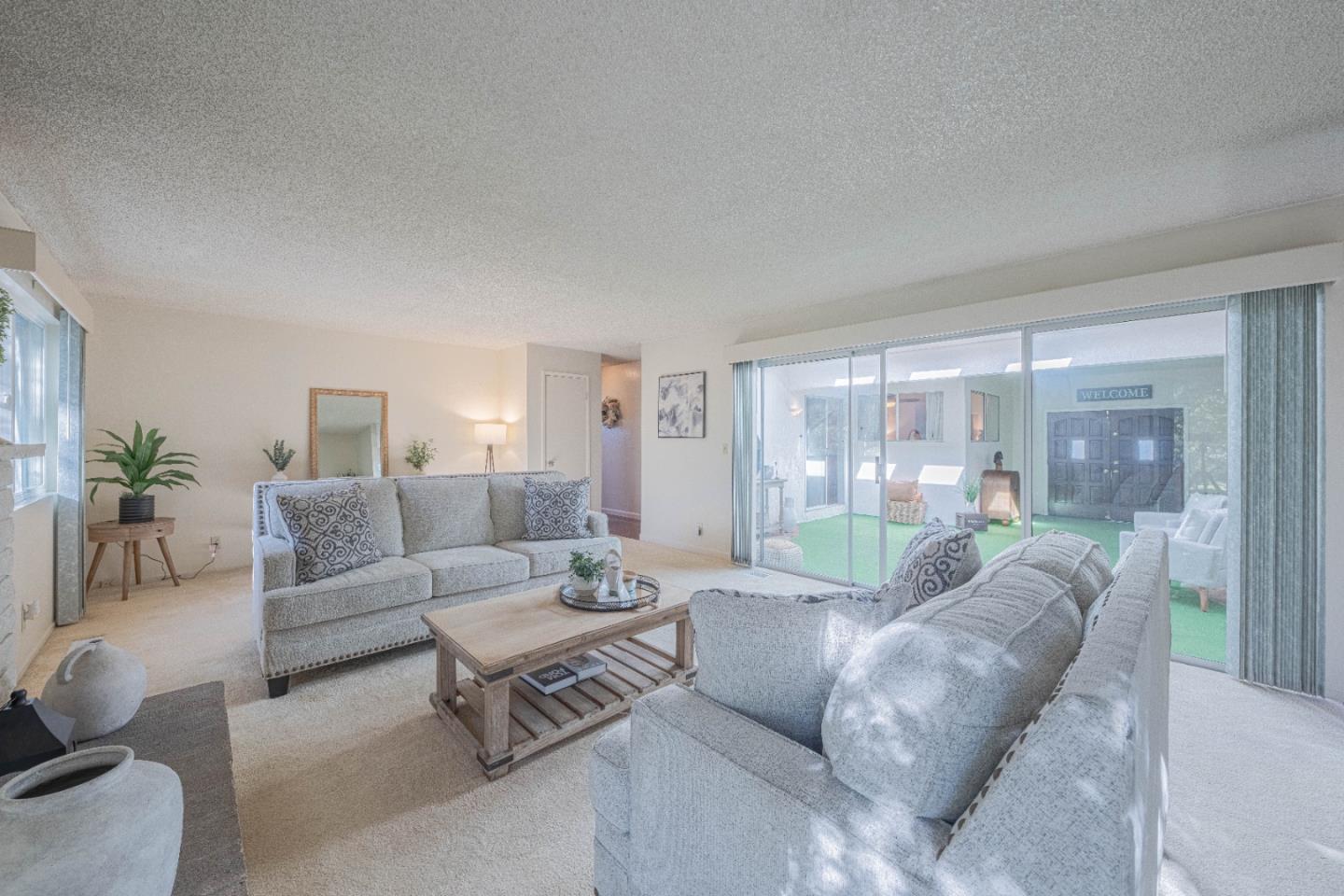 9525 South Century Oak Road Salinas, CA 93907 - Photo 8 of 37 a living room with furniture and a large window