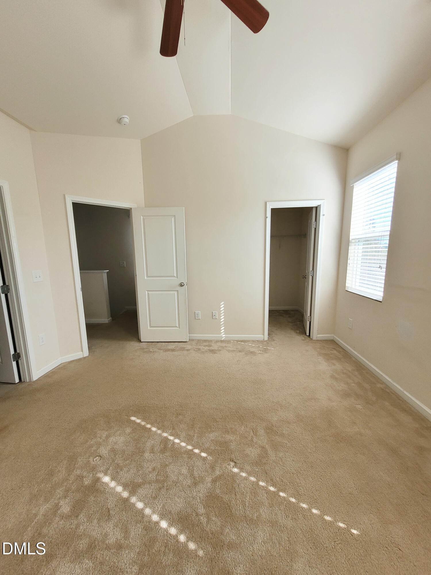 8951 Commons Townes Drive Raleigh, NC 27616 - Photo 19 of 40 a view of an empty room with window and closet area