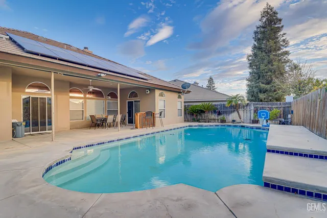 swimming pool view with seating space