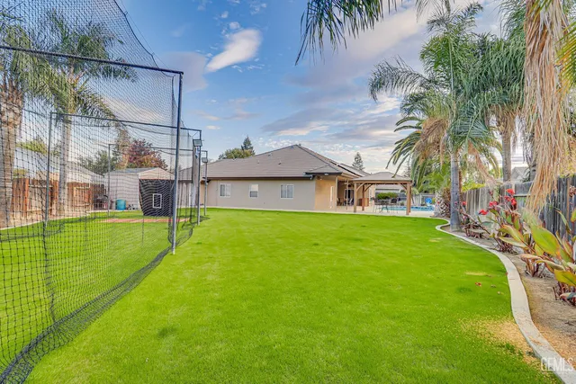 a view of a house with a swimming pool