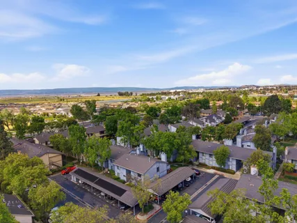 an aerial view of a house with a garden