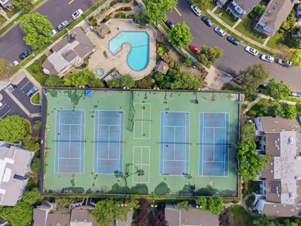 an aerial view of a building and outdoor space