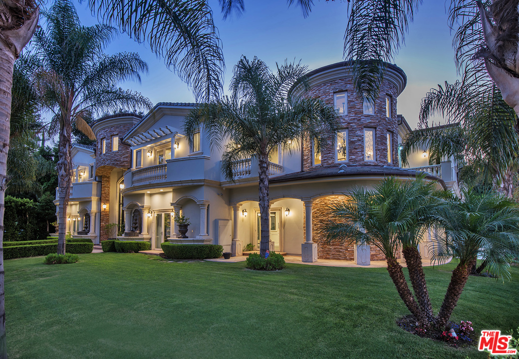 15506 Meadowgate Road Encino, CA 91436 - Photo 2 of 50 a view of a building with a garden