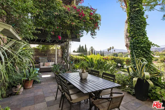 a view of an outdoor space with furniture