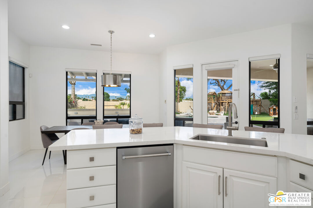 74226 Via Venezia Palm Desert, CA 92260 - Photo 11 of 38 a bathroom with a sink and a mirror