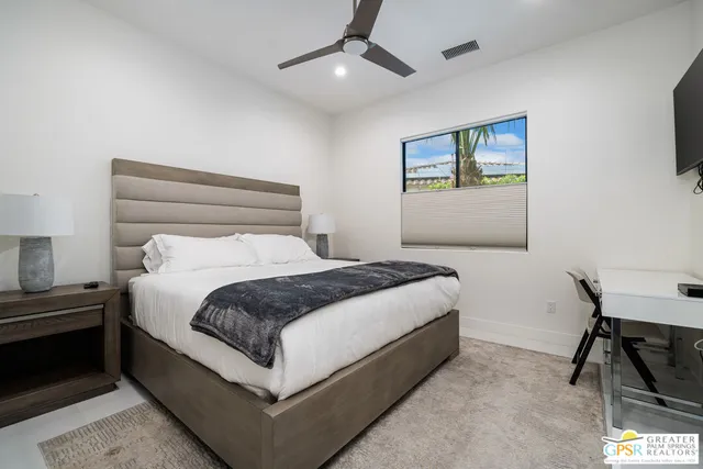 a bathroom with a double vanity sink mirror and