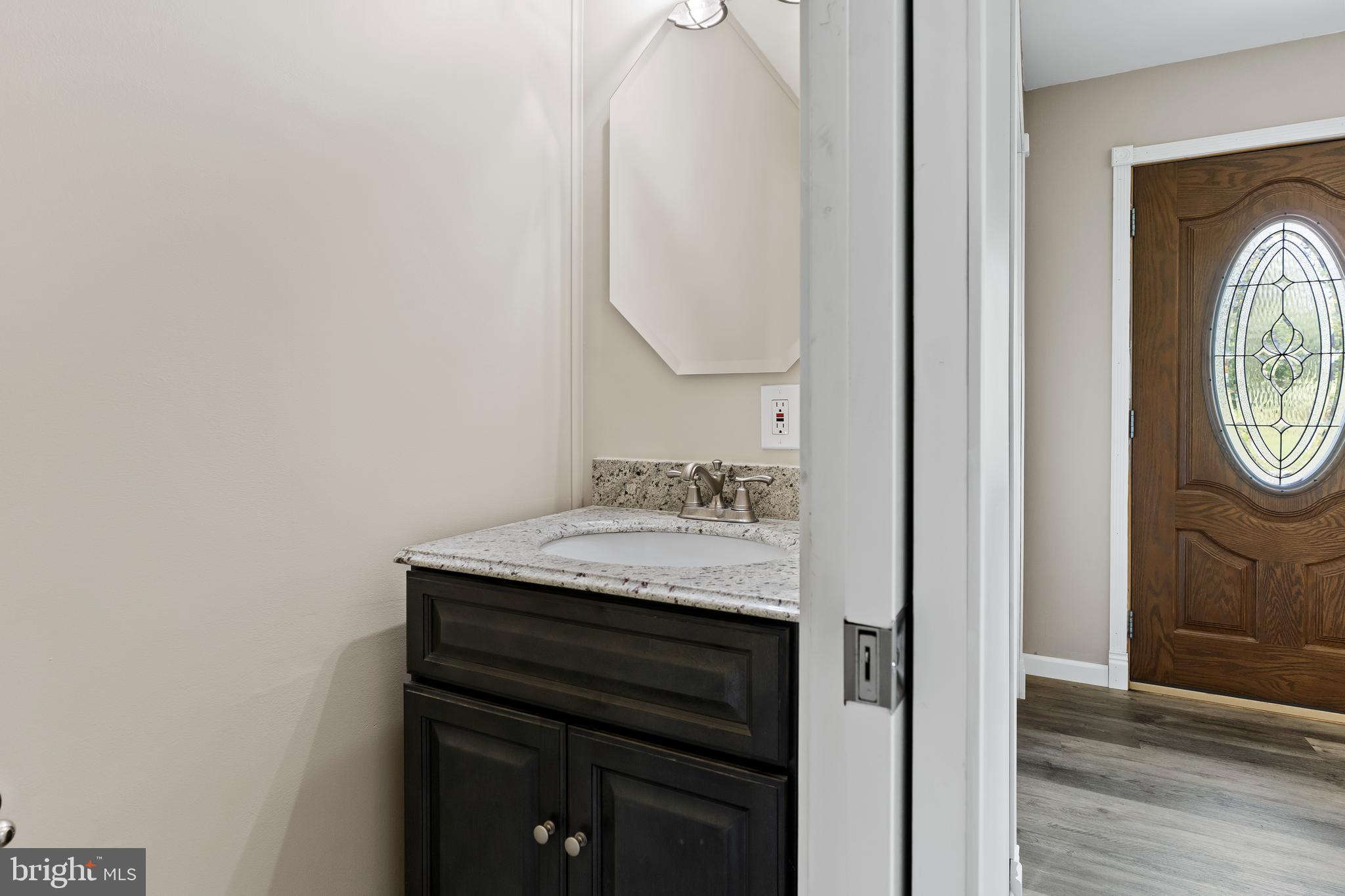 7310 Jonestown Road Harrisburg, PA 17112 - Photo 8 of 27 1st floor half bath