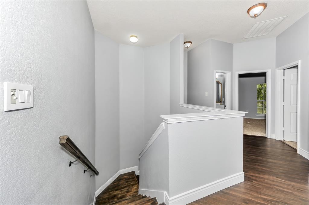 13637 Cherokee Ranch Road Fort Worth, TX 76262 - Photo 30 of 37 Stairs to upstairs living space