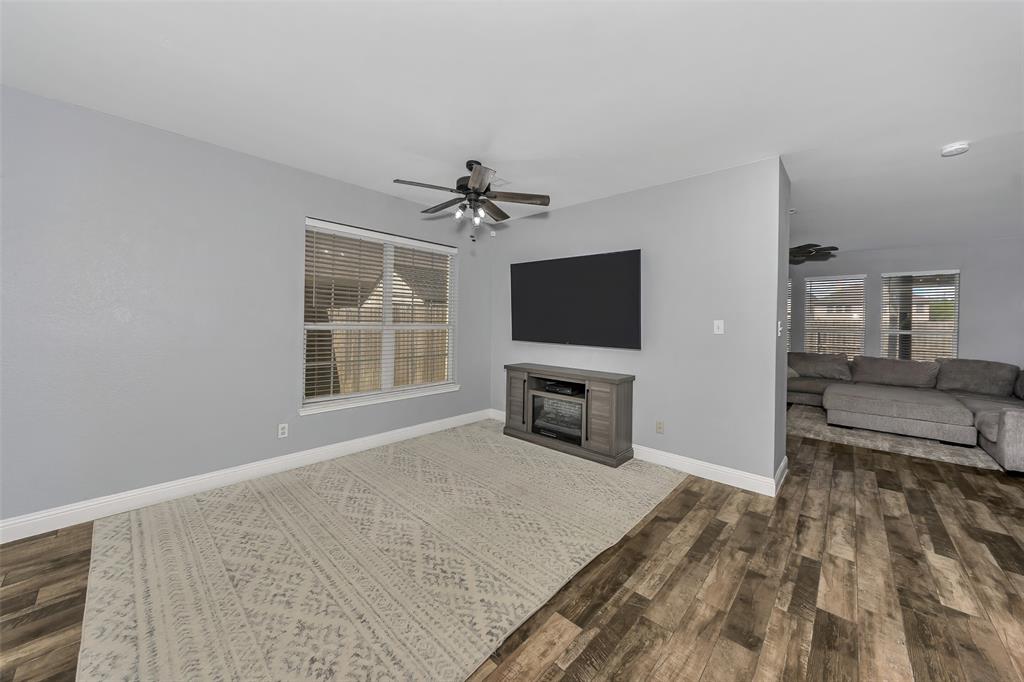 13637 Cherokee Ranch Road Fort Worth, TX 76262 - Photo 4 of 37 Downstairs living/dining space view 2