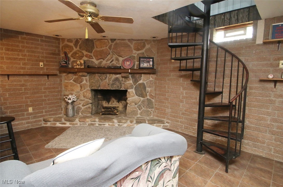9229 Bascom Road Chardon, OH 44024 - Photo 30 of 45 Lower Level Recreation Room with Fireplace and Bar