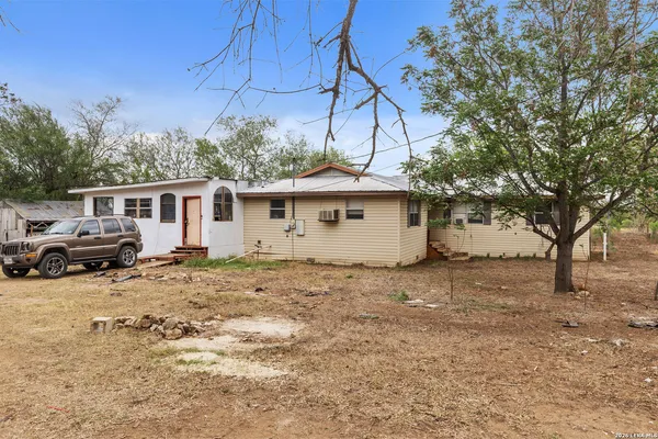 a view of a house with a patio