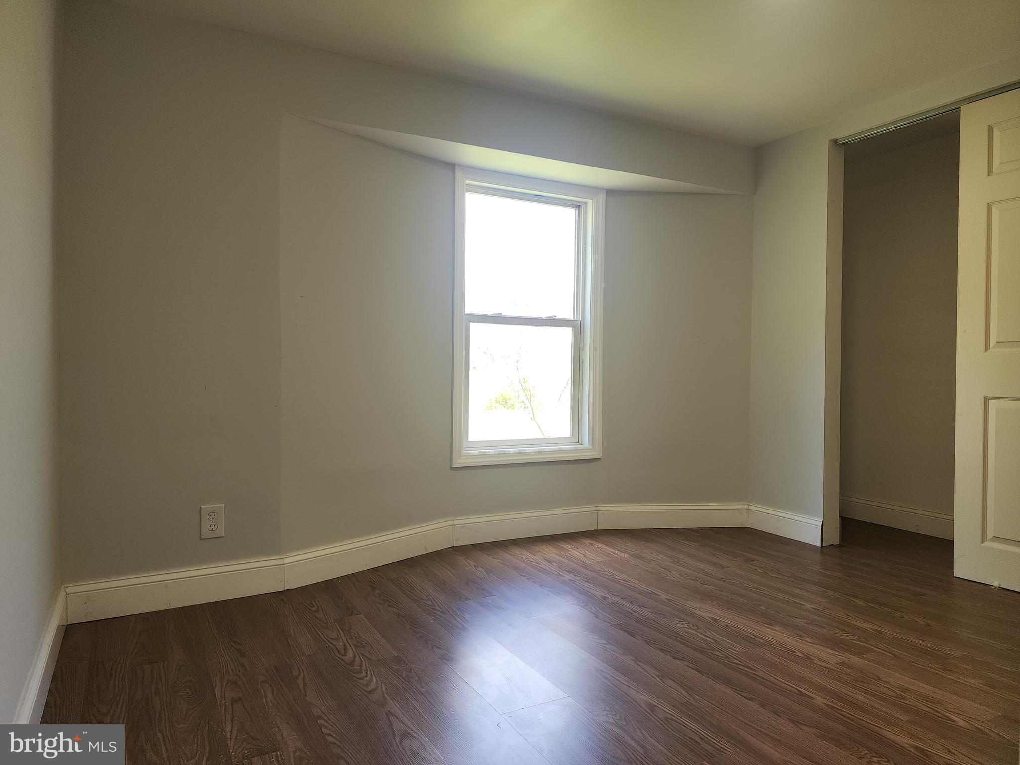 41 Mountain View Terrace Newville, PA 17241 - Photo 24 of 34 an empty room with wooden floor and windows