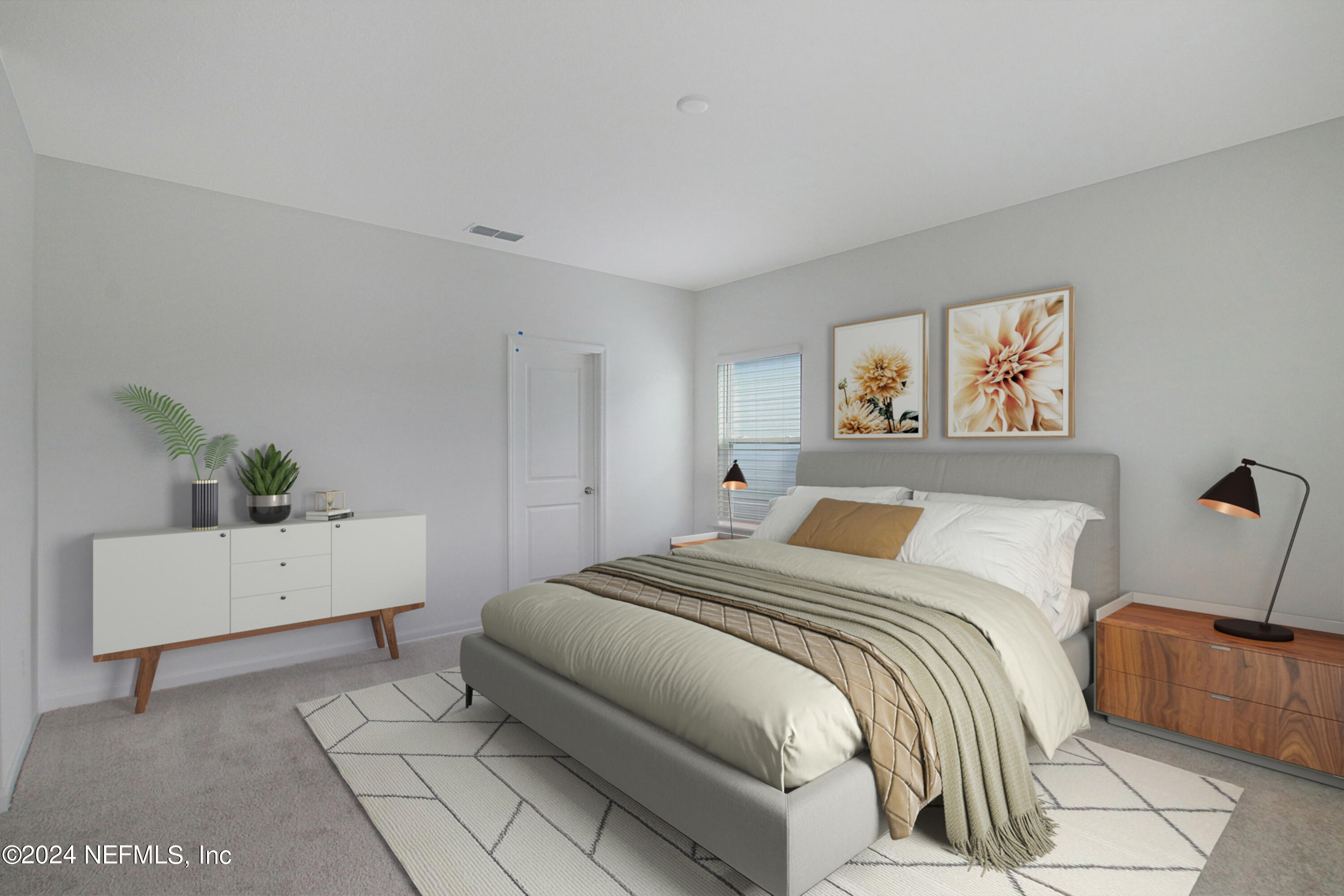 299 Pentwater Road St. Augustine, FL 32092 - Photo 25 of 36 a bedroom with a bed and a couch