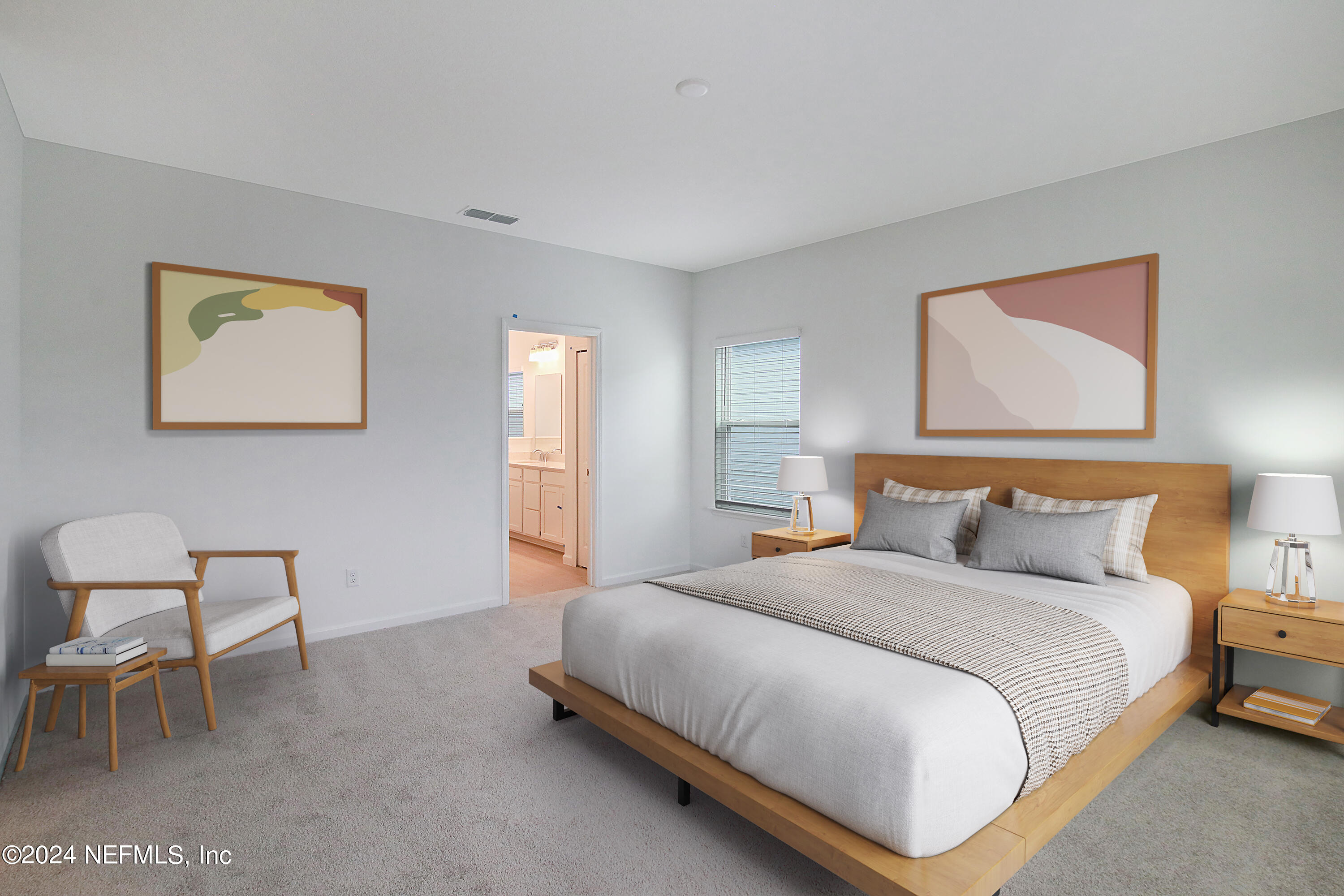 299 Pentwater Road St. Augustine, FL 32092 - Photo 29 of 36 a bedroom with a bed and a chair