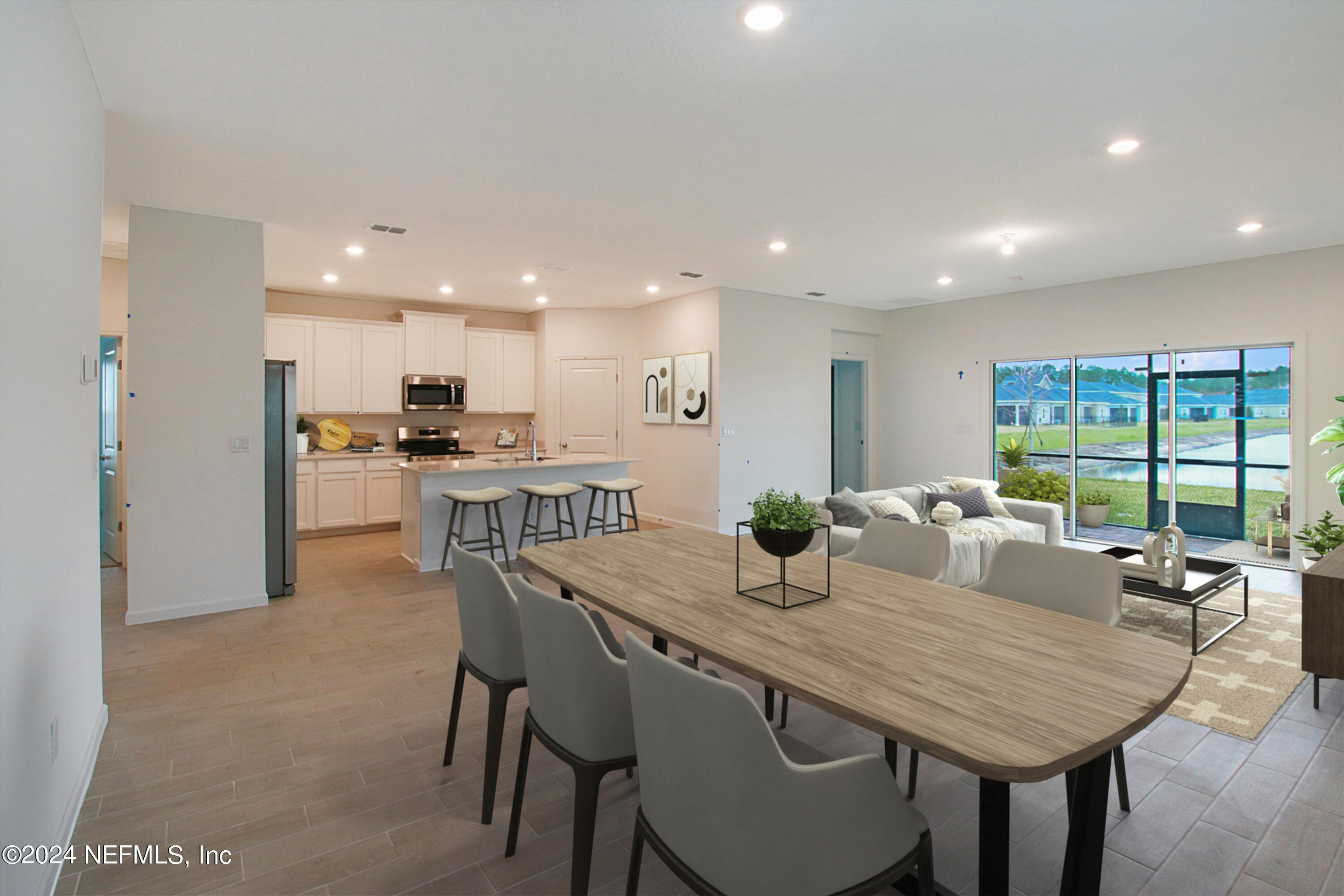 299 Pentwater Road St. Augustine, FL 32092 - Photo 34 of 36 a kitchen with a table and chairs in it