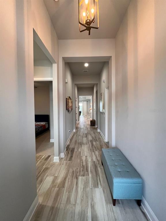 12149 Southwest 33rd Place Gainesville, FL 32608 - Photo 18 of 35 a view of a hallway view with staircase