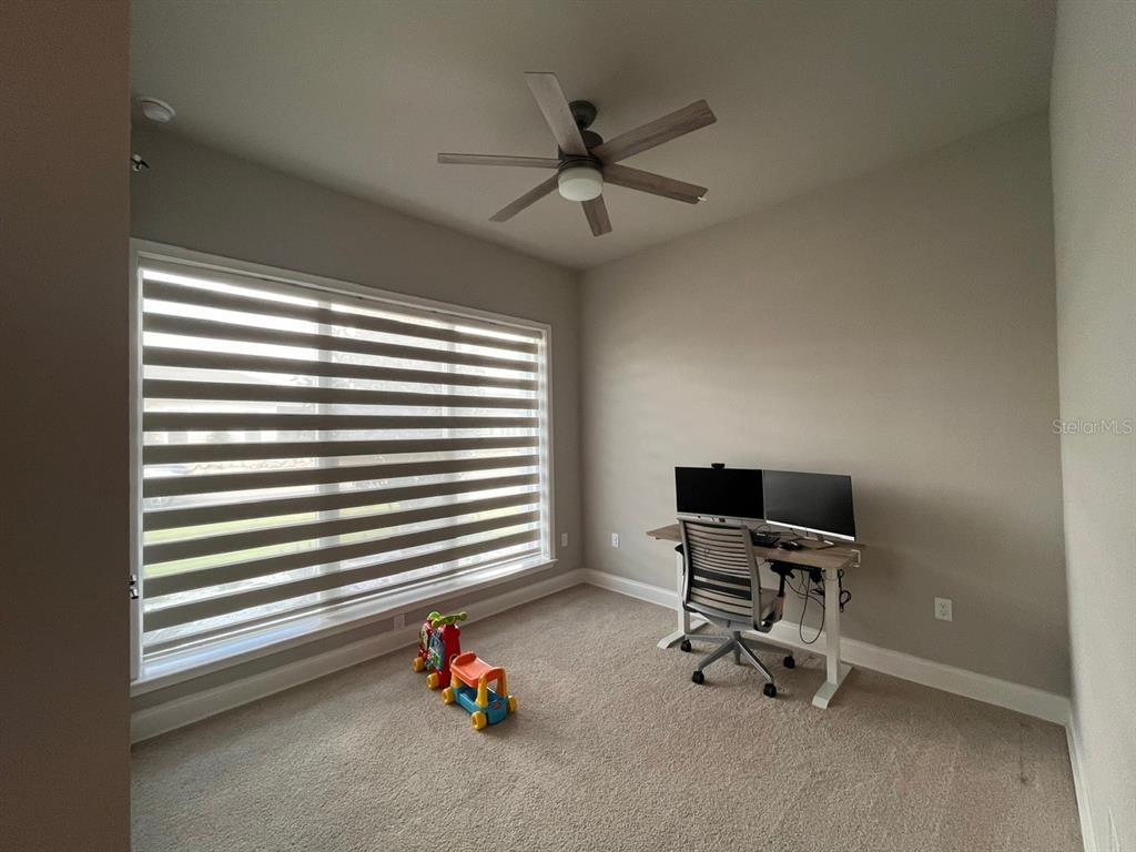 12149 Southwest 33rd Place Gainesville, FL 32608 - Photo 24 of 35 a view of a workspace with a window