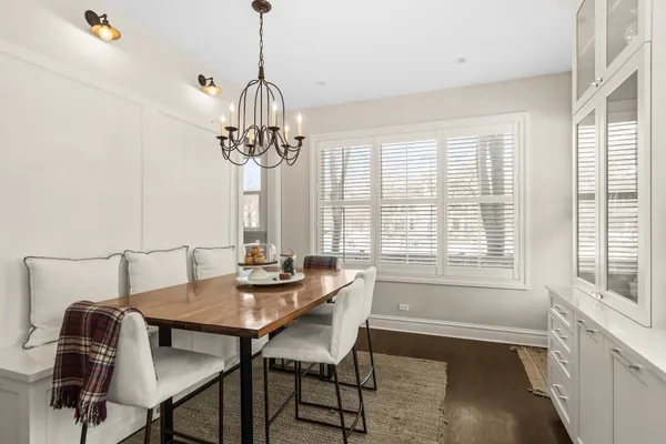 a view of a dining room with furniture window and outside view