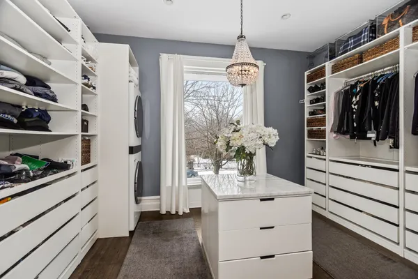 a bedroom with a bed and a table