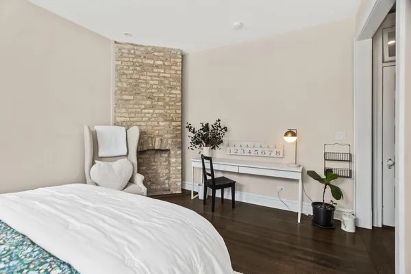 a bedroom with a bed and a closet