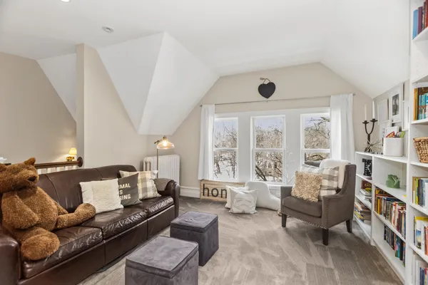 a living room with furniture and a couch
